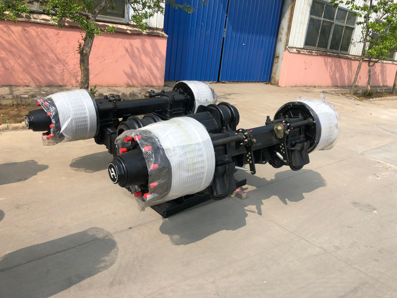 Trailer bogie axle, single point suspensions 